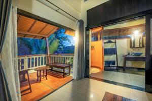Kuchyň nebo kuchyňský kout v ubytování Chada Lanta Beach Resort - SHA Extra Plus