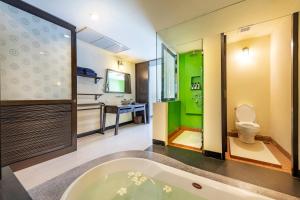 Koupelna v ubytování Chada Lanta Beach Resort - SHA Extra Plus