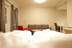 
En eller flere senger på et rom på Runni Gjestegaard
