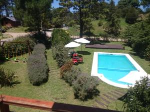 una vista aérea de una piscina en un patio en Puerto Carrasco en Valeria del Mar