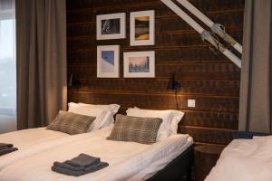 Postel nebo postele na pokoji v ubytování Mountain Lodge
