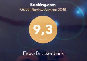 a screenshot of the guest review awards with a yellow circle at FEWO Brockenblick in Allrode