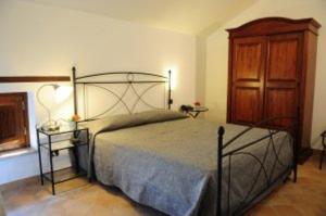 Postel nebo postele na pokoji v ubytování Hotel Dei Templi