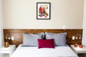 Ένα ή περισσότερα κρεβάτια σε δωμάτιο στο Brasilia Boutique Flats +13 φωτογραφίες