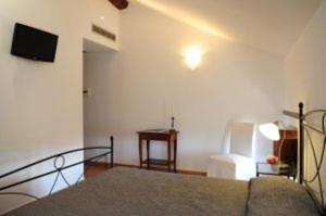 a living room with a couch and a table at Hotel Dei Templi in Paestum