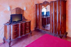 Postel nebo postele na pokoji v ubytování Albergo Diffuso Locanda Specchio Di Diana
