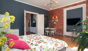 Televízia a/alebo spoločenská miestnosť v ubytovaní Sopot Ostsee Apartments