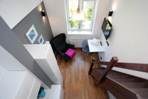 Televízia a/alebo spoločenská miestnosť v ubytovaní Sopot Ostsee Apartments