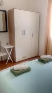 Postel nebo postele na pokoji v ubytování Apartments Pilić
