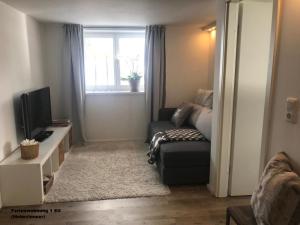 Et opholdsområde på Kräuterhof-Ferienwohnung