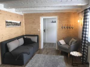 Et opholdsområde på Kräuterhof-Ferienwohnung