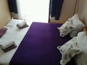 Postel nebo postele na pokoji v ubytování Apartments Alissa