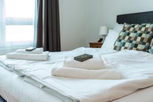Posteľ alebo postele v izbe v ubytovaní Budapest Central Port Apartment