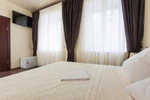Postel nebo postele na pokoji v ubytování Hotel Cristal