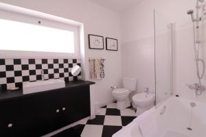 Kylpyhuone majoituspaikassa Apartamento de charme