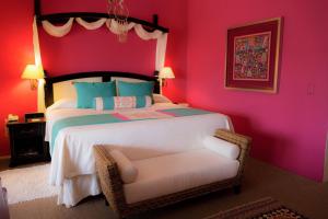 A bed or beds in a room at El Chante Spa Hotel