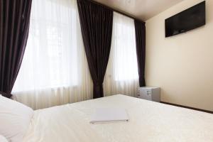 TV a/nebo společenská místnost v ubytování Hotel Cristal