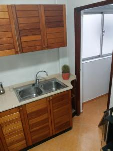 Kuchyň nebo kuchyňský kout v ubytování Apartamento Chabela