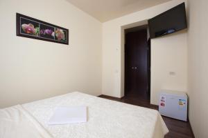 Postel nebo postele na pokoji v ubytování Hotel Cristal