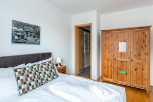Posteľ alebo postele v izbe v ubytovaní Budapest Central Port Apartment