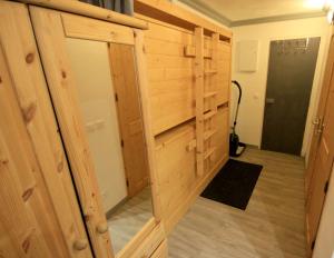 a door leading into a room with a closet at Appartement Le Thuria in Arc 1800