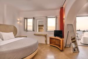 TV a/nebo společenská místnost v ubytování La Bellezza Eco Boutique Hotel