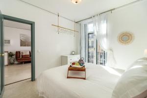 Postel nebo postele na pokoji v ubytování Gran Via Balconies