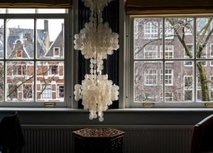 Photo de la galerie de l'établissement Rosalia's Menagerie Cocktail Lounge & InnUpstairs, à Amsterdam