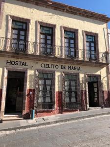 a building with a sign that reads hostel guilia de maria at Hostal Cielito De María in Zacatecas