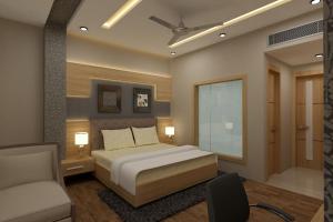 Ein Bett oder Betten in einem Zimmer der Unterkunft CSJS Inn Hotel