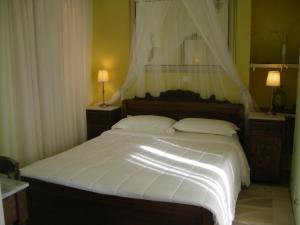 Postel nebo postele na pokoji v ubytování Meliti Guesthouse