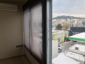 Nespecifikovaný výhled na hory nebo výhled na hory při pohledu z aparthotelu