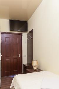 Postel nebo postele na pokoji v ubytování Hotel Cristal