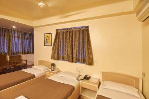 Krevet ili kreveti u jedinici u objektu Hotel Shivkrupa