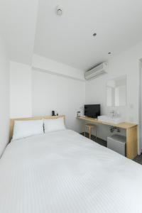 Katil atau katil-katil dalam bilik di Imu Hotel Kyoto