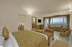 Fateh Safari Suites by Fateh Collection客房内的一张或多张床位