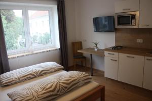 Kuchyň nebo kuchyňský kout v ubytování Bed & Breakfast + 7 fotografií