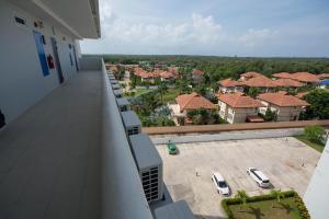 a balcony of a building with a view of a parking lot at Grandblue Condominium 708 in Ban Nam Lai Ta Tum