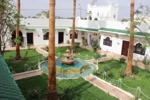 Aed väljaspool majutusasutust Hotel Riad L' Arganier D' Or