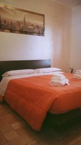 Un pat sau paturi într-o cameră la Villa Elegance