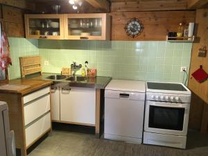 Kuhinja ili čajna kuhinja u objektu Chalet Beauroc
