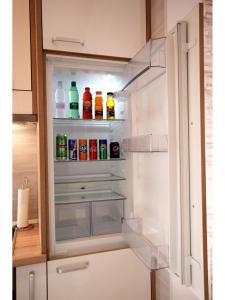 Kuchyň nebo kuchyňský kout v ubytování Apartment Dinko