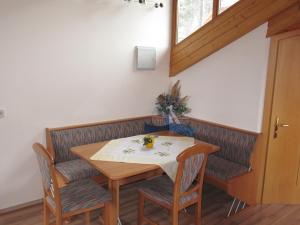 Un lugar para sentarse en Ferienwohnungen Haus Bliem 35 fotos más