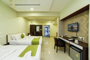 Cama o camas de una habitación en Sreepathi Indraprastha