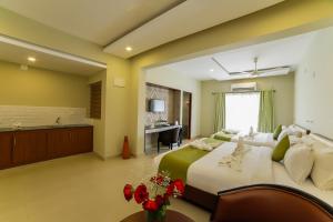 Cama o camas de una habitación en Sreepathi Indraprastha