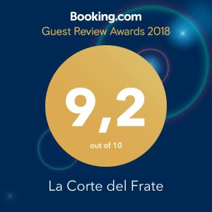 a flyer for a quest review awards with a yellow circle at La Corte del Frate in Podere Panzano