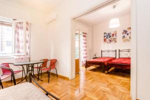 Postel nebo postele na pokoji v ubytování Petaluda House 3
