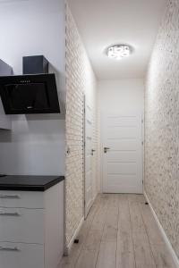Kuchnia lub aneks kuchenny w obiekcie Apartament Rynek Sienny 1
