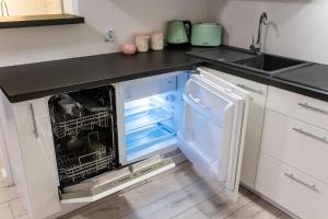 Kuchnia lub aneks kuchenny w obiekcie Apartament Rynek Sienny 1