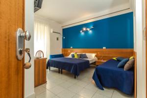 Posteľ alebo postele v izbe v ubytovaní Hotel Viterbo Inn + 37 fotografií